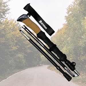 Close-up of cork grip and adjustable wrist strap on trekking poles