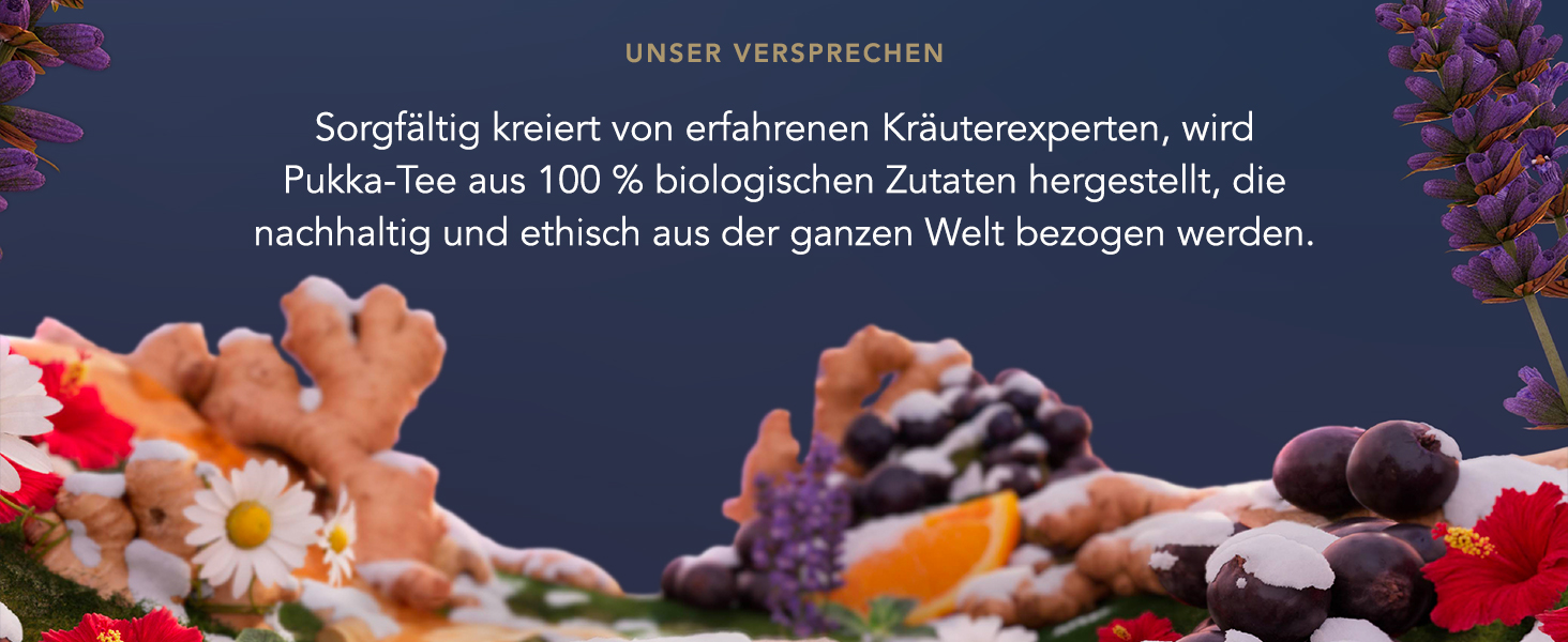 Unterwasserszene mit orangefarbenen und rosafarbenen Korallenformationen vor dunkelblauem Hintergrund.