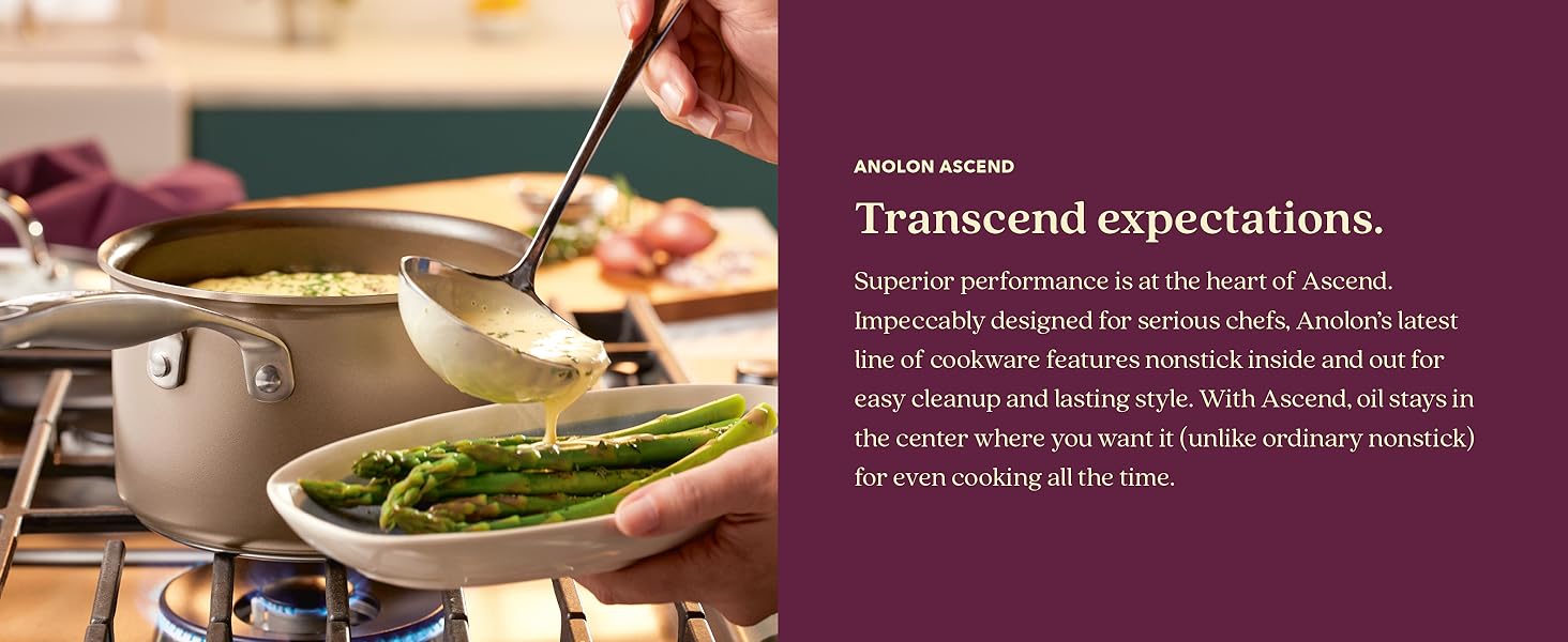 image of Anolon Ascend Saucepan with sauce that is being ladled over a plate of cooked asparagus