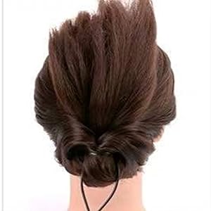 The ponytail is stuck in the curler