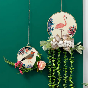 Flowers and green leaves surround the wood chips