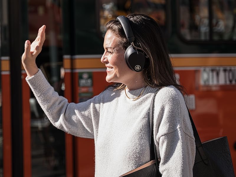 Woman wearing epic lux lab edition headphones outdoors