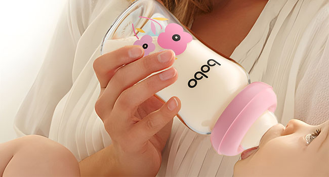 Glass milk storage bottles