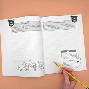 Open book with hand holding a pencil.