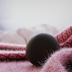 Calma ball lying on a blanket