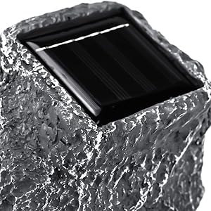 Solar powered rock light from behind showing the solar panel and rock design