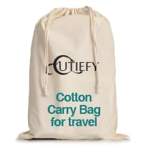 the baby changing basket folded up for travel in the cotton carry bag