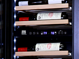 Closeup of front-facing wine view bottle racks with wine labels showing