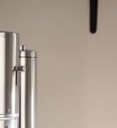 aarke carbonator pro A unique sparkling water maker in stainless steel, with glass bottle.