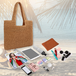 Large enough capacity to hold magazines, iPads, umbrellas, cell phones, lipsticks, wallets