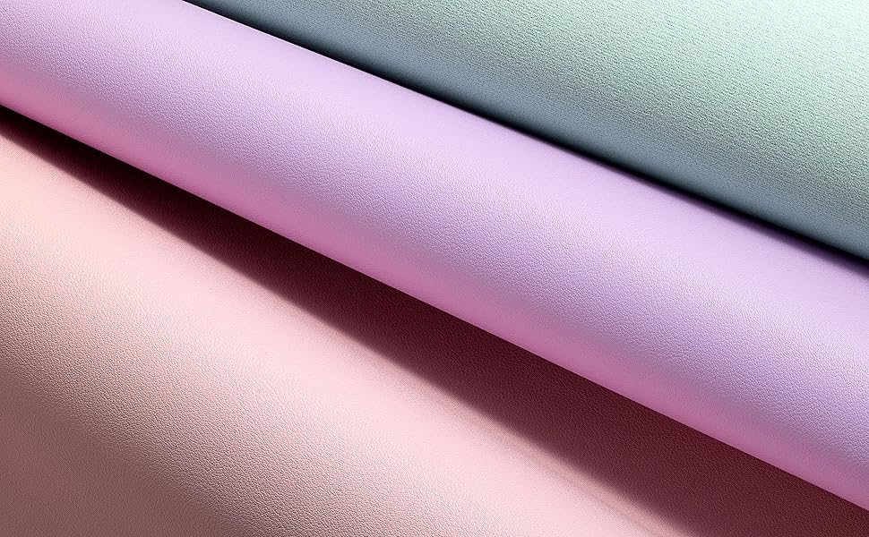 a close up of a pink and blue fabric with a pink and blue pattern.