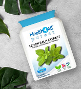 White resealable pouch containing lemon balm extract. Package features blue and green design elements, with plant leaves visible in the background.