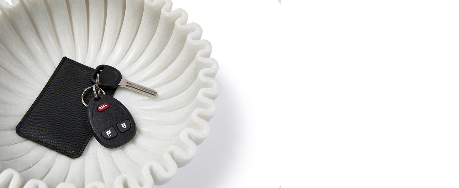 white decorative bowl for keys in entryway