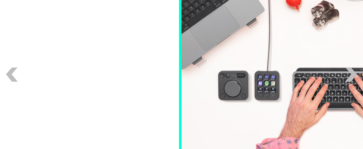 a man working on a computer using mx keys s wireless keyboard and mx creative console