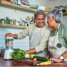 Couple making a smoothie with DeepMarine Canadian Collagen Powder