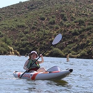 Woman paddling the Buoy Watersports Echo Single Kayak