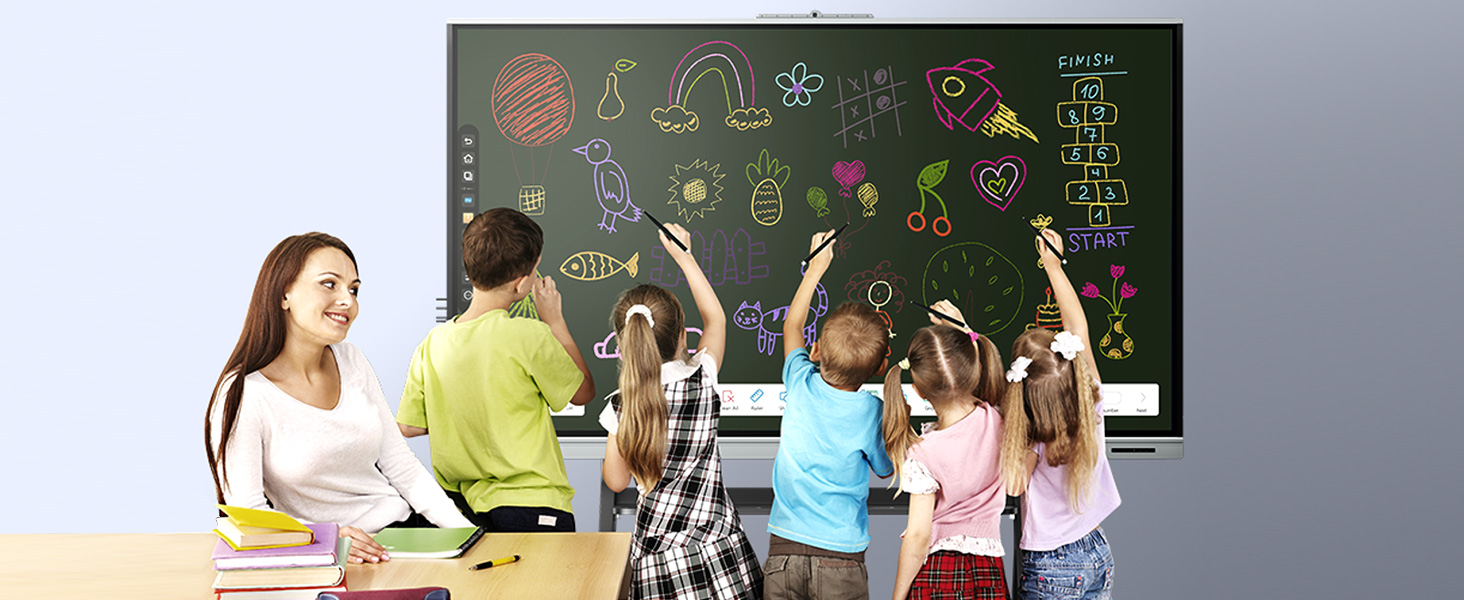 Children draw together on the Smart Board as a teacher and mom guide them with care
