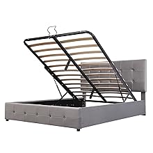the bed frame is made of a steel frame and is made of a dark grey fabric.