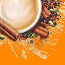 Image of chai tea surrounded by ingredients