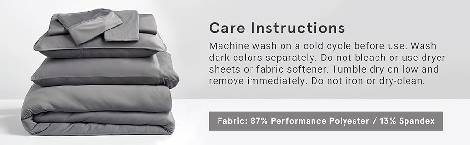 A stack of the SHEEX Original Performance cooling sheets, pillowcases, comforter.