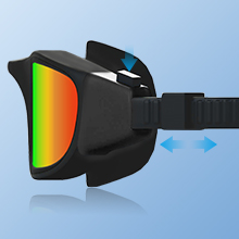 con montura negra y lentes teñidas de arcoíris, que muestran indicadores de flujo de aire direccional sobre fondo azul