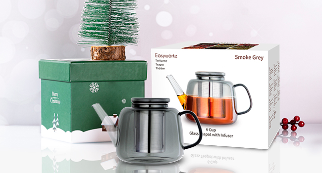 Modern glass teapot with metallic base and handle, shown from multiple angles against white and holiday-themed backgrounds with decorative elements.