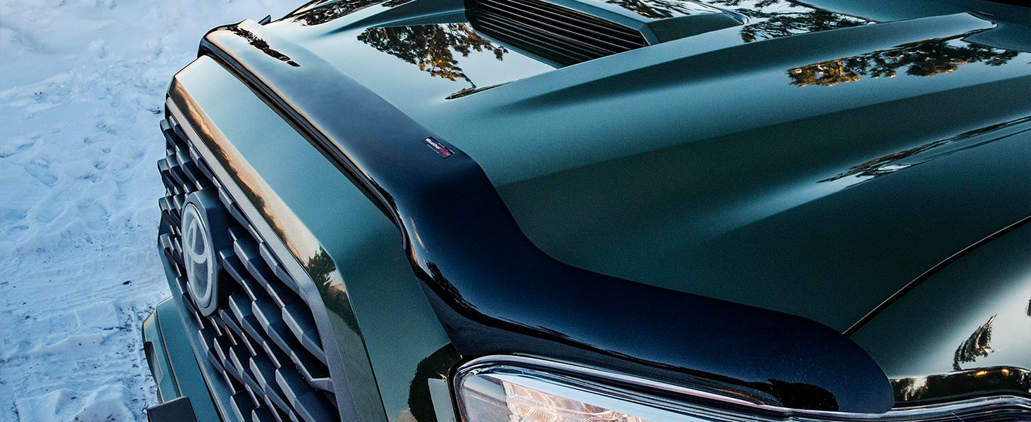 WeatherTech Stone and bug deflector on toyota tacoma green in snow