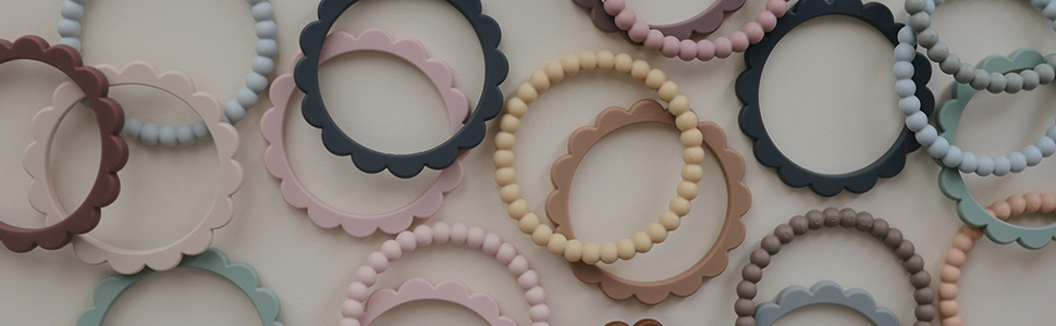 mushie silicone teething flower and pearl bracelets