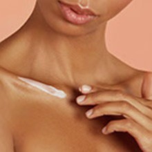 Talent applying the moisturizer