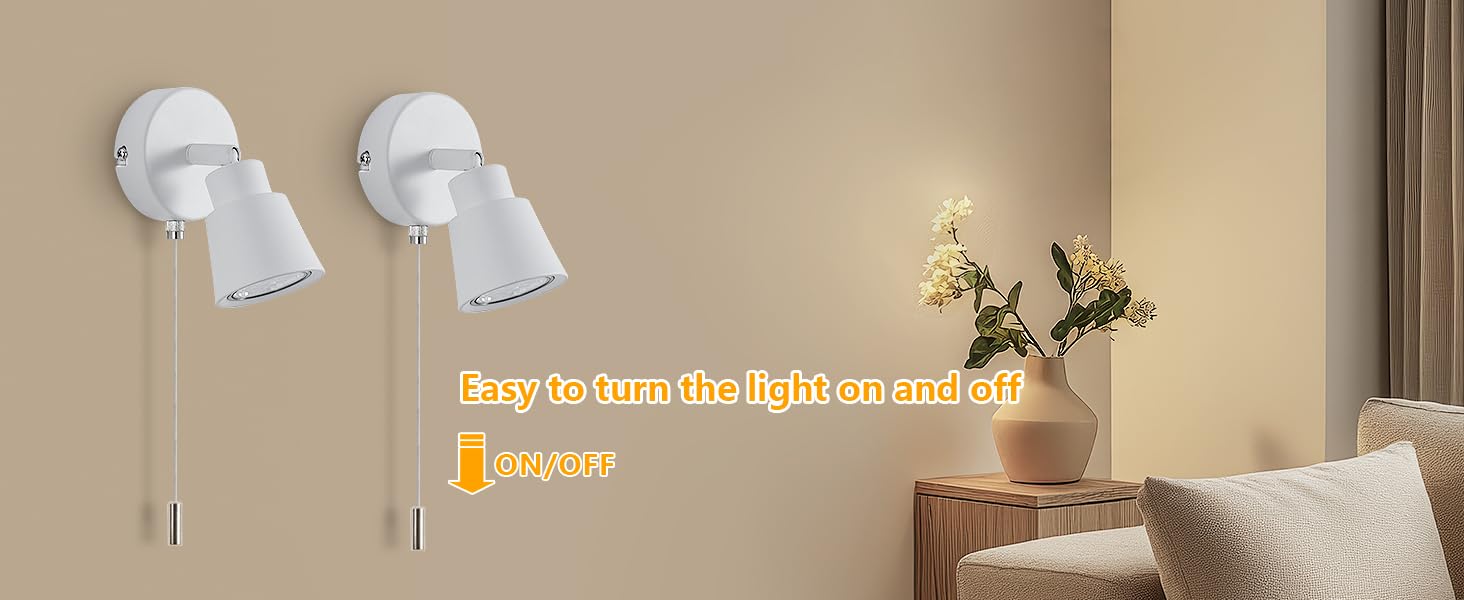 Two white adjustable wall sconces mounted in a beige living room. Text overlay reads 'Easy to use for light sources in every room.'