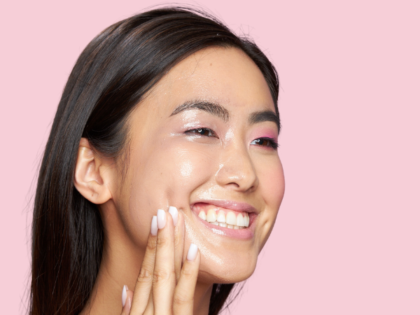 woman massaging cleansing balm into makeup