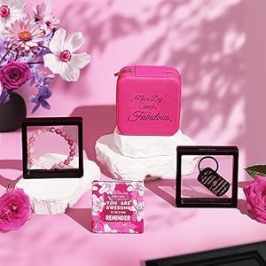 Elegant gift set including a jewelry organizer, makeup mirror, bracelet, and keychain