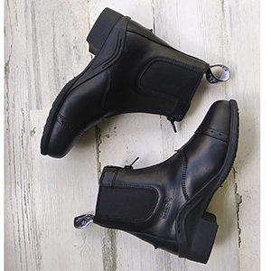 Top down image pf the rachel or nora boots on white wood