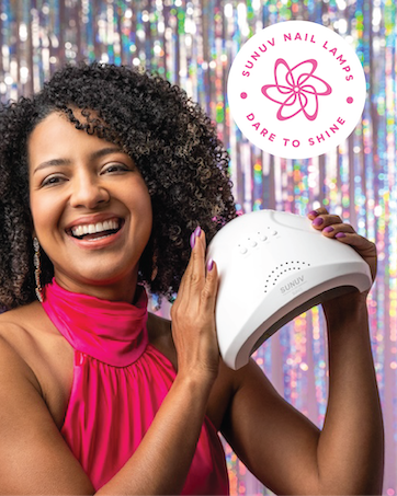 White dome-shaped nail lamp device with ventilation holes, shown with pink floral logo design in circular format.