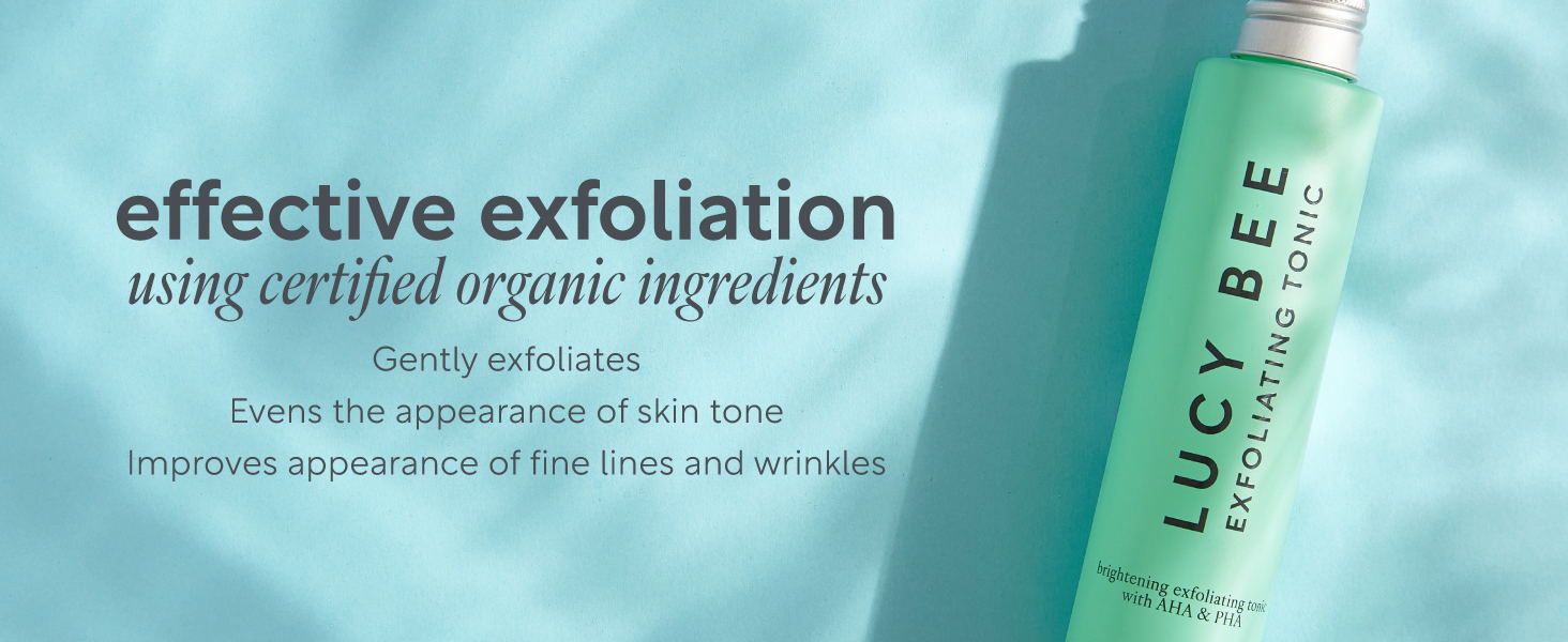 Deep exfoliating tonic on blue background, clean, vegan and organic toner. 