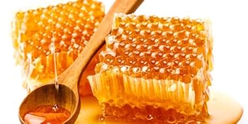 Close-up sequence of golden honeycomb with honey dripping. Multiple frames show honey's viscous flow and texture in detail.
