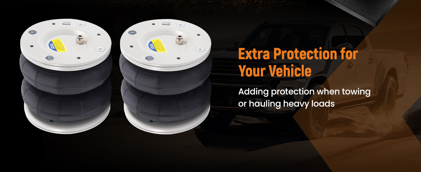 Two circular white and black suspension components for vehicle protection. Text indicates they provide extra protection when towing or hauling heavy loads.