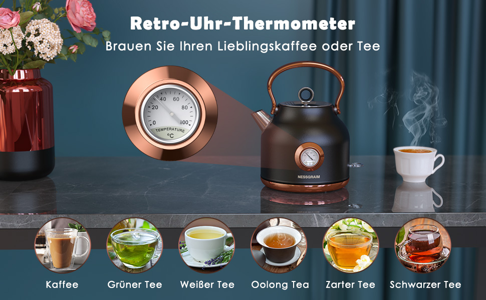 the teapot is a teapot with a tea kettle and a teapot with a copper handle.