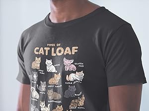 Man wearing “Types of Cat Loaf” T-shirt featuring 15 illustrated cats with funny loaf-inspired names