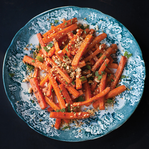 top down photograph of sweet potato fries on a delicate blue plate