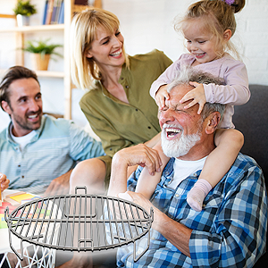 Family happily playing after dinner