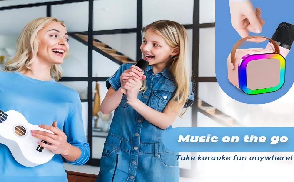 Mom and daughter singing karaoke together with colorful portable Bluetooth speaker and mic