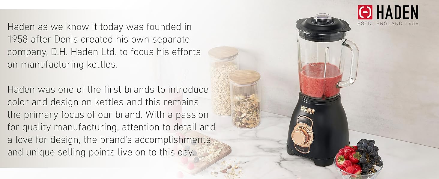 A kitchen blender with a glass jar placed on a kitchen tile countertop. Text reads: Haden.