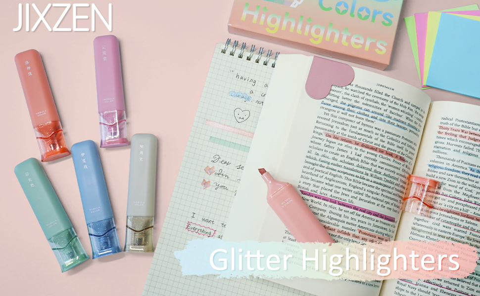 Glitter highlighters placed next to books on the desk