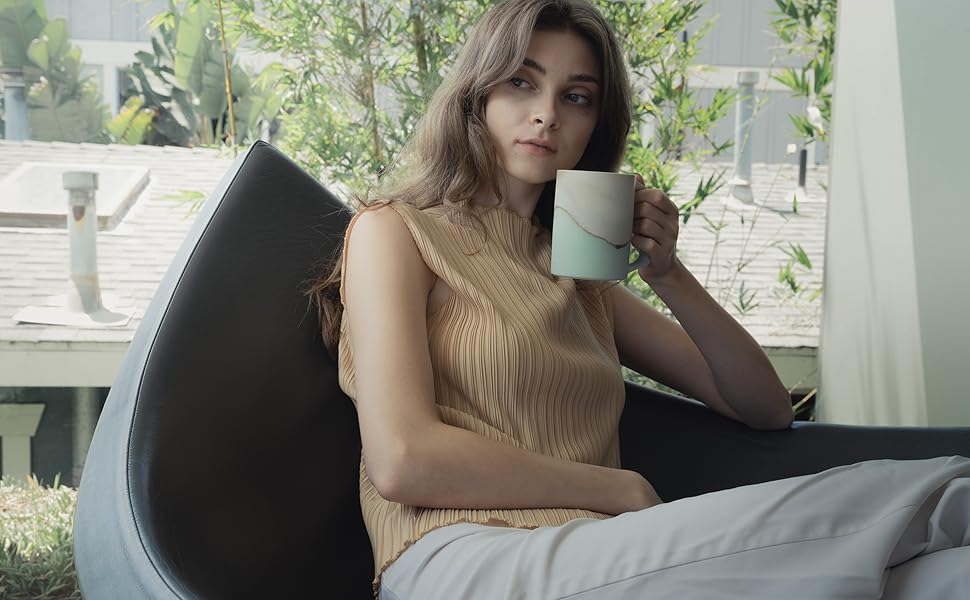 Lady holding Artist Collection Mint