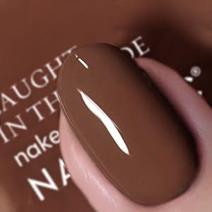 nail with brown nail polish on