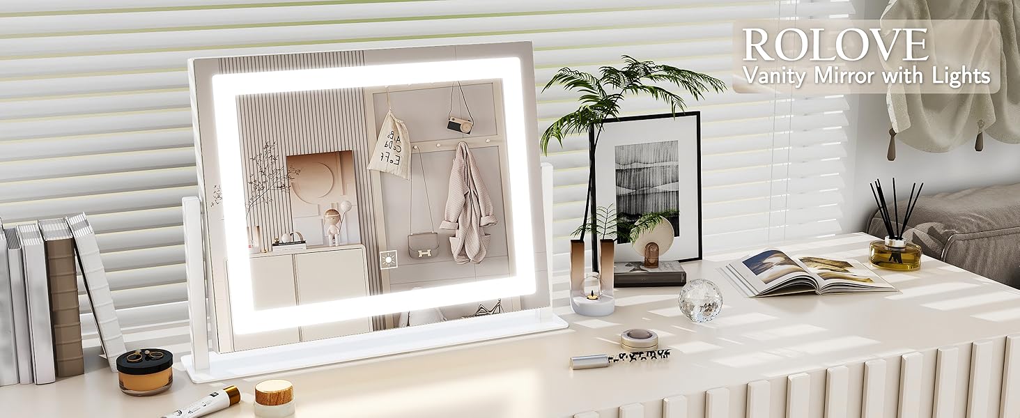 A square makeup mirror with a lamp on the makeup table