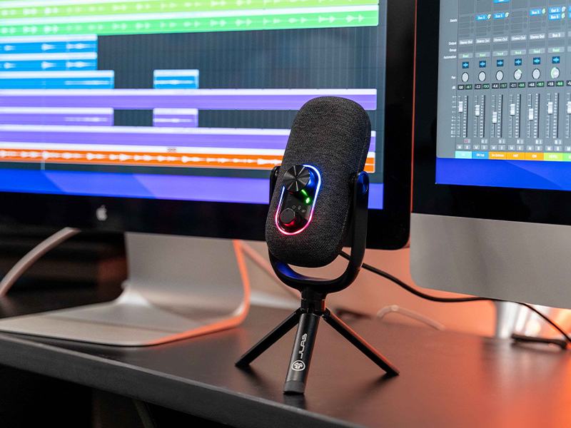 Epic mouse in front of studio recording equipment