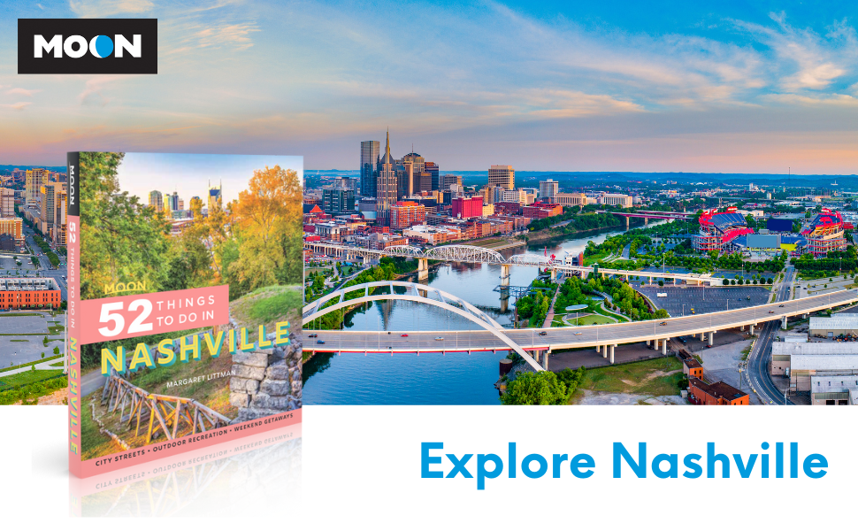 Bird's eye view of city skyline and bridges over river at sunset with text explore Nashville