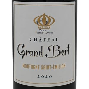 Flasche Rotwein mit schwarz-goldenem Etikett. Das Etikett trägt ein Kronenlogo und einen Text, darunter „Grand Pinel“.